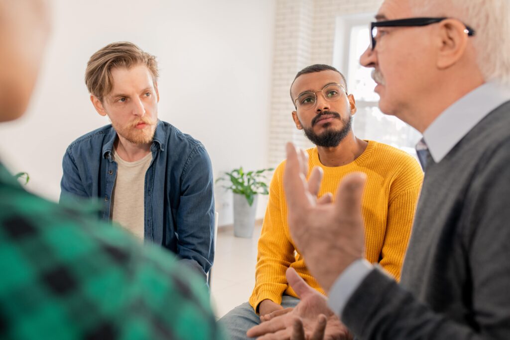 Men enjoy a group session during prescription drug rehab in Nashville, TN